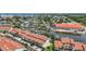 An aerial view showcases condos near a waterway with convenient boat docks at 2363 Hanover Dr, Dunedin, FL 34698
