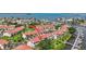 Breathtaking aerial view of a waterfront community, lush landscaping, and boat docks, offering a serene coastal lifestyle at 2363 Hanover Dr, Dunedin, FL 34698