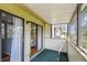 This screened balcony offers a private outdoor space with sliding glass doors at 2363 Hanover Dr, Dunedin, FL 34698