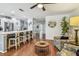 Inviting living room showcasing hardwood floors, modern furniture, and natural light from an open floorplan at 2363 Hanover Dr, Dunedin, FL 34698
