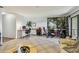 A versatile living room with ample space for relaxation, work, and fitness at 2363 Hanover Dr, Dunedin, FL 34698