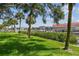 Well maintained lawn view of the channel with an overview of the boat storage at 2363 Hanover Dr, Dunedin, FL 34698