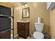 Cozy bathroom featuring a vanity and toilet with yellow painted walls at 2501 18Th S Ave, St Petersburg, FL 33712