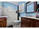 Bright bathroom features a bathtub, white cabinets, and a modern vanity at 2501 18Th S Ave, St Petersburg, FL 33712