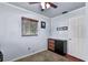 Bedroom with a ceiling fan, wood floor, and a modern dresser at 2501 18Th S Ave, St Petersburg, FL 33712
