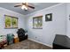 Bedroom with two windows and neutral walls, offering a versatile space at 2501 18Th S Ave, St Petersburg, FL 33712