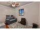 Inviting bedroom with hardwood floors, a ceiling fan, and a comfortable seating area at 2501 18Th S Ave, St Petersburg, FL 33712
