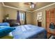 Bedroom featuring hardwood floors and an ensuite bathroom at 2501 18Th S Ave, St Petersburg, FL 33712