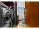 Laundry area showing a washer and dryer, plus a view into the adjacent bathroom at 2501 18Th S Ave, St Petersburg, FL 33712