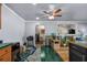 Living room with tile and wood flooring, plus an open layout connecting multiple rooms at 2501 18Th S Ave, St Petersburg, FL 33712
