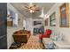 Living room featuring hardwood floors and comfortable seating with natural light at 2501 18Th S Ave, St Petersburg, FL 33712