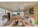 Spacious sun room with tile flooring and fans at 2501 18Th S Ave, St Petersburg, FL 33712