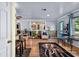 Inviting living room featuring hardwood floors, a large window, and stylish decor at 2501 18Th S Ave, St Petersburg, FL 33712