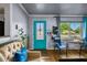 Cozy living room with a front door view, natural light, and hardwood floors at 2501 18Th S Ave, St Petersburg, FL 33712