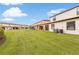 A view of the exterior and back of the house at 2628 Oleander Lakes Dr, Brandon, FL 33511