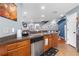This kitchen features stainless steel appliances, plenty of counter space, and a view to the dining area at 2628 Oleander Lakes Dr, Brandon, FL 33511