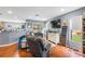 Bright and airy living room with hardwood floors, modern furnishings, and open layout at 2628 Oleander Lakes Dr, Brandon, FL 33511