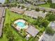 A relaxing community pool and gathering area surrounded by lush, manicured grounds at 2628 Oleander Lakes Dr, Brandon, FL 33511