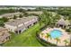 A beautiful pool in the community area with meticulously maintained grounds at 2628 Oleander Lakes Dr, Brandon, FL 33511