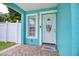 Close-up of the entryway with a decorative door and a welcome mat at 2715 Bel Aire Cir, Tampa, FL 33614