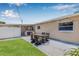 The backyard patio has outdoor seating and a bar making it perfect for entertaining guests at 2861 Pinellas Point S Dr, St Petersburg, FL 33712