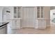 Elegant kitchen featuring white cabinetry, stylish countertops, and modern appliances at 304 Caloosa Palms Ct, Sun City Center, FL 33573