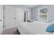 View of bedroom with large double door closet, and an open door to the ensuite bathroom at 308 Mangrove Shade Cir, Apollo Beach, FL 33572