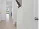 The hallway features tile floors and natural light at 308 Mangrove Shade Cir, Apollo Beach, FL 33572