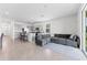 Open concept living room and kitchen area with lots of natural light at 308 Mangrove Shade Cir, Apollo Beach, FL 33572