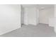 An open loft space with carpeted flooring and neutral walls at 308 Mangrove Shade Cir, Apollo Beach, FL 33572