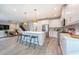 Open kitchen featuring a large island, stainless appliances, and an open floor plan at 3144 Mountain Spruce Ter, Wesley Chapel, FL 33543