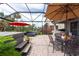 Outdoor patio with seating, hot tub, and bar creates a perfect backyard retreat at 3144 Mountain Spruce Ter, Wesley Chapel, FL 33543