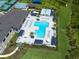 An inviting community pool and lounge area, perfect for relaxation and recreation at 3144 Mountain Spruce Ter, Wesley Chapel, FL 33543