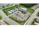 Community clubhouse featuring a pool, tennis courts, basketball court, and ample parking at 3318 Woodland Brook Way, Wesley Chapel, FL 33543