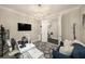 Well-lit home office featuring a modern desk, comfortable seating, and stylish decor, perfect for productivity at 3318 Woodland Brook Way, Wesley Chapel, FL 33543