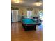This community game room includes a pool table and stylish decor at 337 S Mcmullen Booth Rd # 157, Clearwater, FL 33759