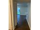 Hallway view featuring wood-look flooring leading to the outside patio at 337 S Mcmullen Booth Rd # 157, Clearwater, FL 33759
