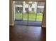 View from the patio showcases well-maintained lawn and neighboring buildings, bringing the outdoors in at 337 S Mcmullen Booth Rd # 157, Clearwater, FL 33759