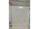 Shower and tub with white tile and standard shower head fixture at 337 S Mcmullen Booth Rd # 157, Clearwater, FL 33759