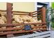 Wooden crate full of natural sea wool sponges for sale, with a handwritten price sign at 346 Gray Oak Dr, Tarpon Springs, FL 34689