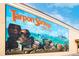 Detailed mural depicting Tarpon Springs history, featuring a diving helmet and sea sponges at 346 Gray Oak Dr, Tarpon Springs, FL 34689
