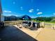A large outdoor patio features patio furniture and a view of the water at 3501 Pine Top Dr, Valrico, FL 33594