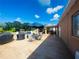 The spacious back patio has both an open area and a covered area at 3501 Pine Top Dr, Valrico, FL 33594