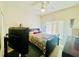 Bedroom with a ceiling fan and a window with blinds at 3501 Pine Top Dr, Valrico, FL 33594