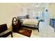 Comfortable bedroom with a ceiling fan, natural light, and neutral decor at 3501 Pine Top Dr, Valrico, FL 33594