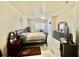 Bright bedroom with a comfortable bed, ceiling fan, and ample storage space at 3501 Pine Top Dr, Valrico, FL 33594
