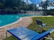 Relax at the community pool with ample space for lounging and enjoying the outdoors at 3501 Pine Top Dr, Valrico, FL 33594