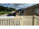 A spacious outdoor patio with a dining area and a barbecue grill, perfect for entertaining guests at 3501 Pine Top Dr, Valrico, FL 33594