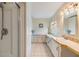 This bathroom has double sinks and a shower; perfect for a quick morning routine at 36731 Tara Ave, Zephyrhills, FL 33542