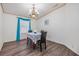 Dining room with natural light, modern flooring, and elegant chandelier at 36731 Tara Ave, Zephyrhills, FL 33542